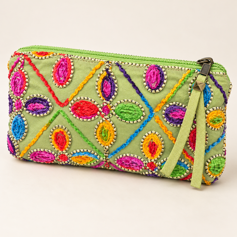 Angled view of Atenti Confetti Garden Tall Tool Pouch, showing raised multicolor embellishment and a green zipper pull.