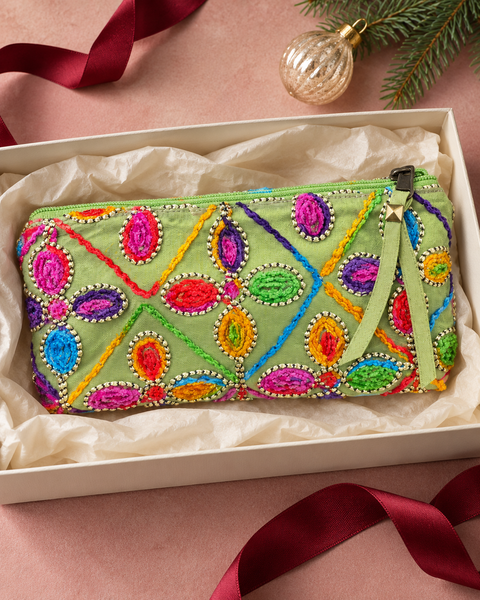 Atenti Confetti Garden Tall Tool Pouch in a tissue-lined holiday gift box with burgundy ribbon.