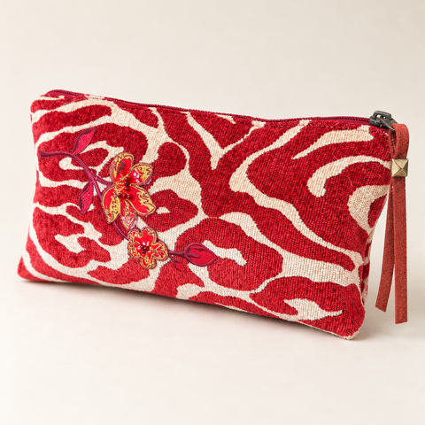 Atenti Scarlet Zebra Tall Tool Pouch with red and cream zebra stripes, floral embellishment and a red zipper pull.