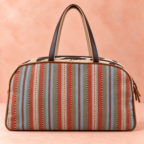 Bronco patchwork Overnighter back with multicolored striped fabric and long brown handles
