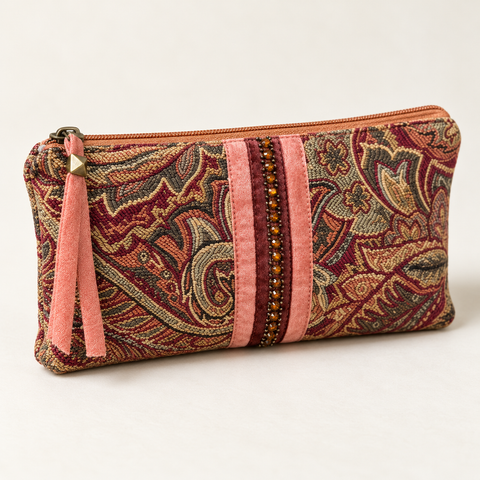 Angled view of Atenti Rose Paisley Tall Tool Pouch, showing pink ribbon trim and a coordinating zipper pull.