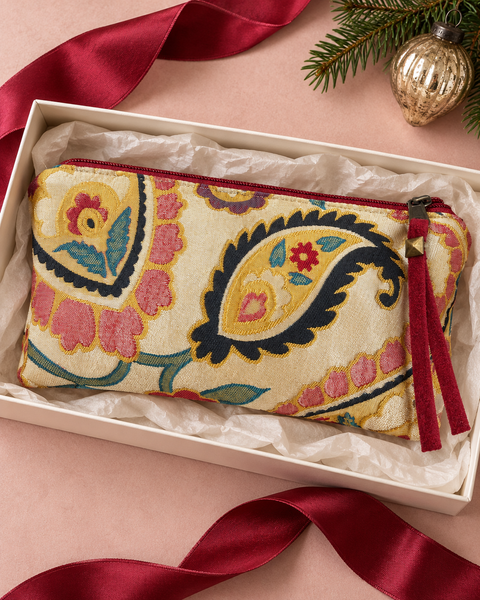 Atenti Jewel Paisley Tall Tool Pouch nestled in a tissue-lined holiday gift box with burgundy ribbon.