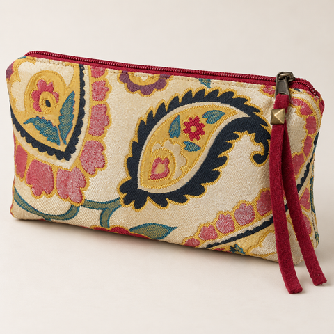 Angled view of Atenti Jewel Paisley Tall Tool Pouch, showing colorful paisley fabric and a burgundy zipper pull.